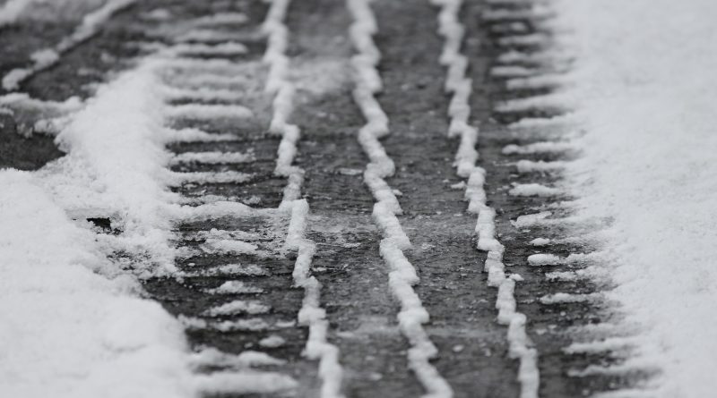 snow ice tire tracks storm