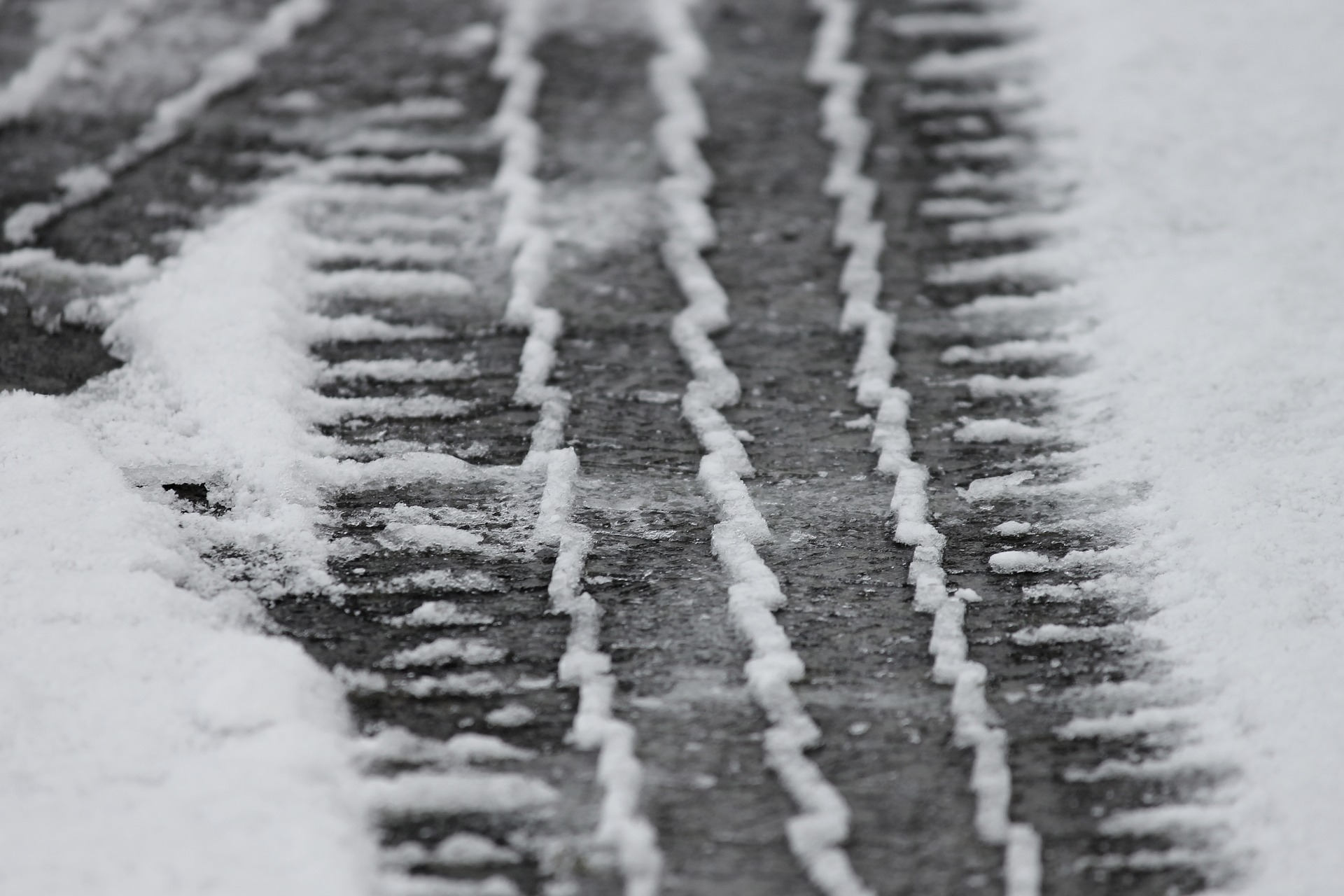 snow ice tire tracks storm