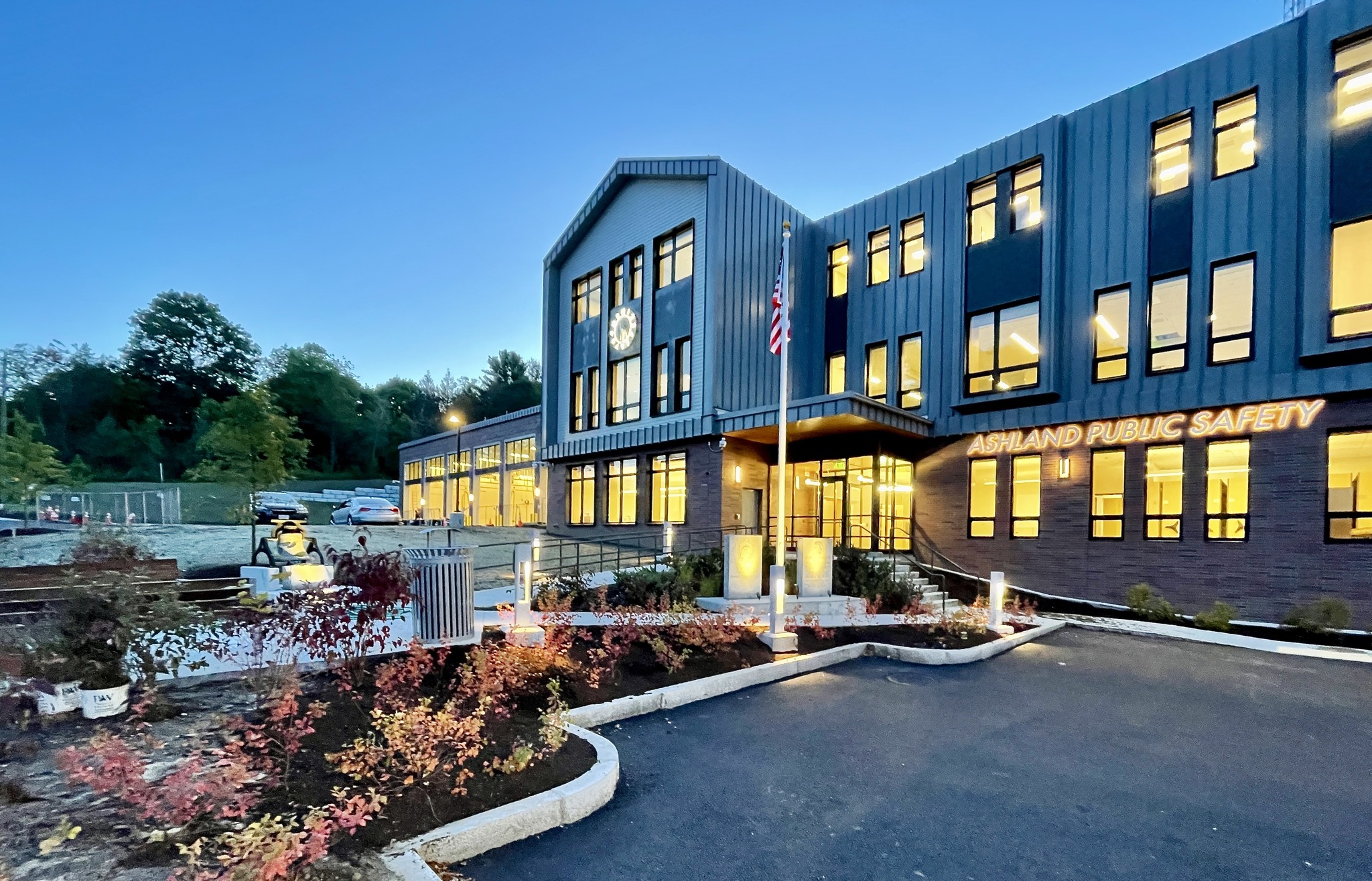 Ashland Public Safety Building lit up at night.