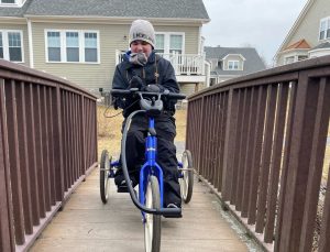 Nicholas Diomede riding bike provided by SMILE Mass