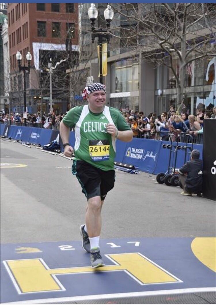 MassBay Community College alum Dan O’Neil, completing the Boston Marathon in 2017, at the finish line in Boston, MA, April 2017. Dan will compete in the April 15, 2024, race to raise money for MassBay student scholarships (Photo/ Dan O’Neil).