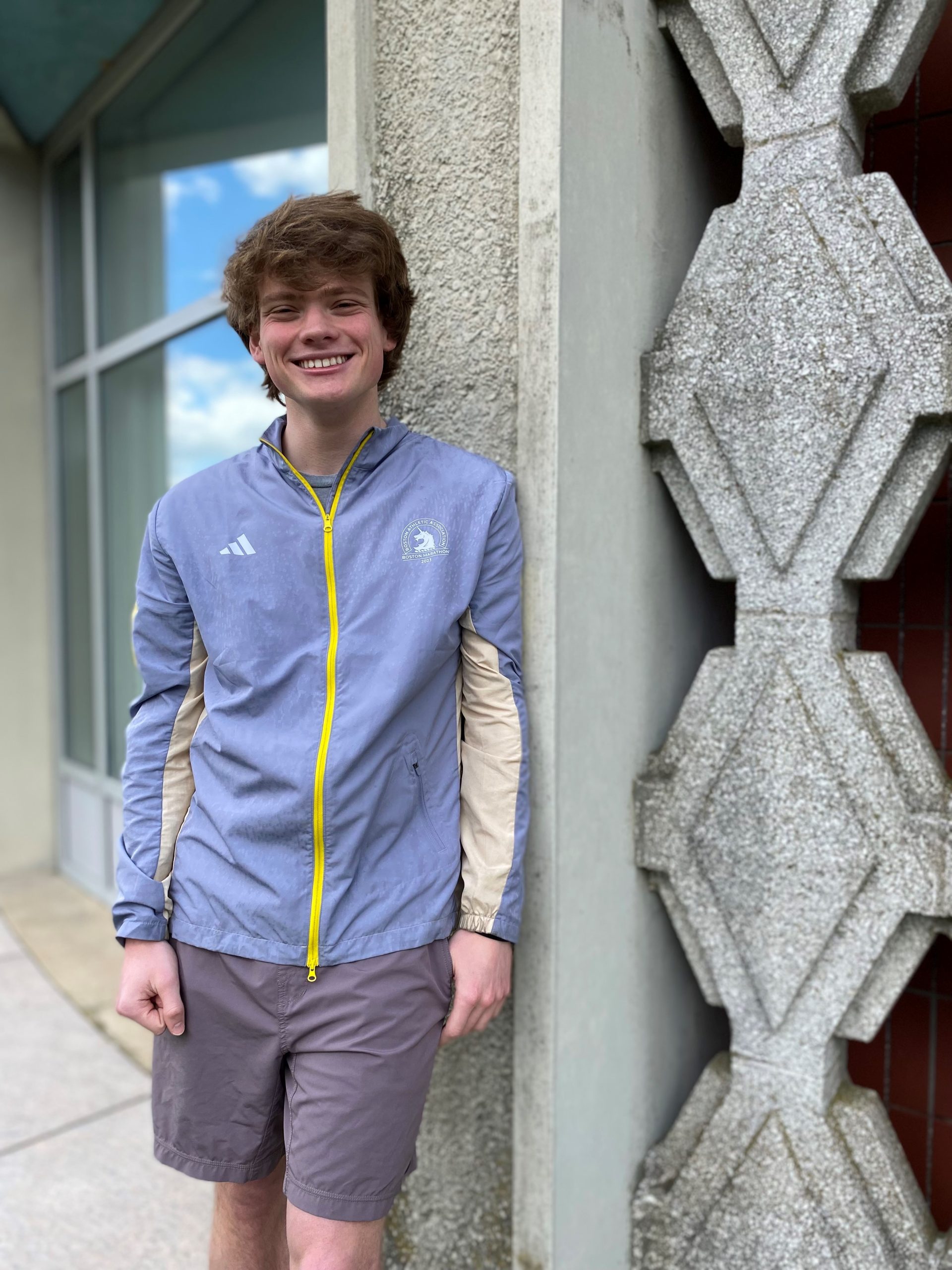 MassBay Community College Liberal Arts, Communication graduate Ronan Keane poses on the Wellesley Hills campus, Wellesley Hills, MA, April 2024 (Photo/ MassBay Community College)