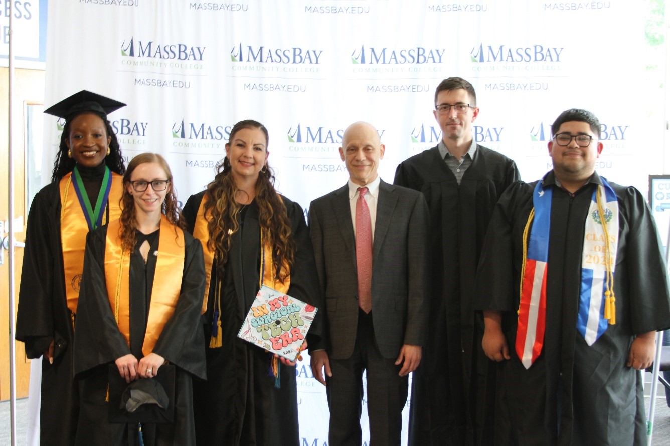 MassBay Community College 2024 Commencement Award Winners pose with MassBay President David Podell before the 62nd Commencement ceremony (from left to right) Esther Jagwer, Hannah Almeida, Jessica Honeywell, MassBay President David Podell, Christopher Bryan Simmans, and Douglas Fernando Centeno on the Wellesley Hills campus, Wellesley Hills, MA, May 2024 (Photo/ MassBay Community College)