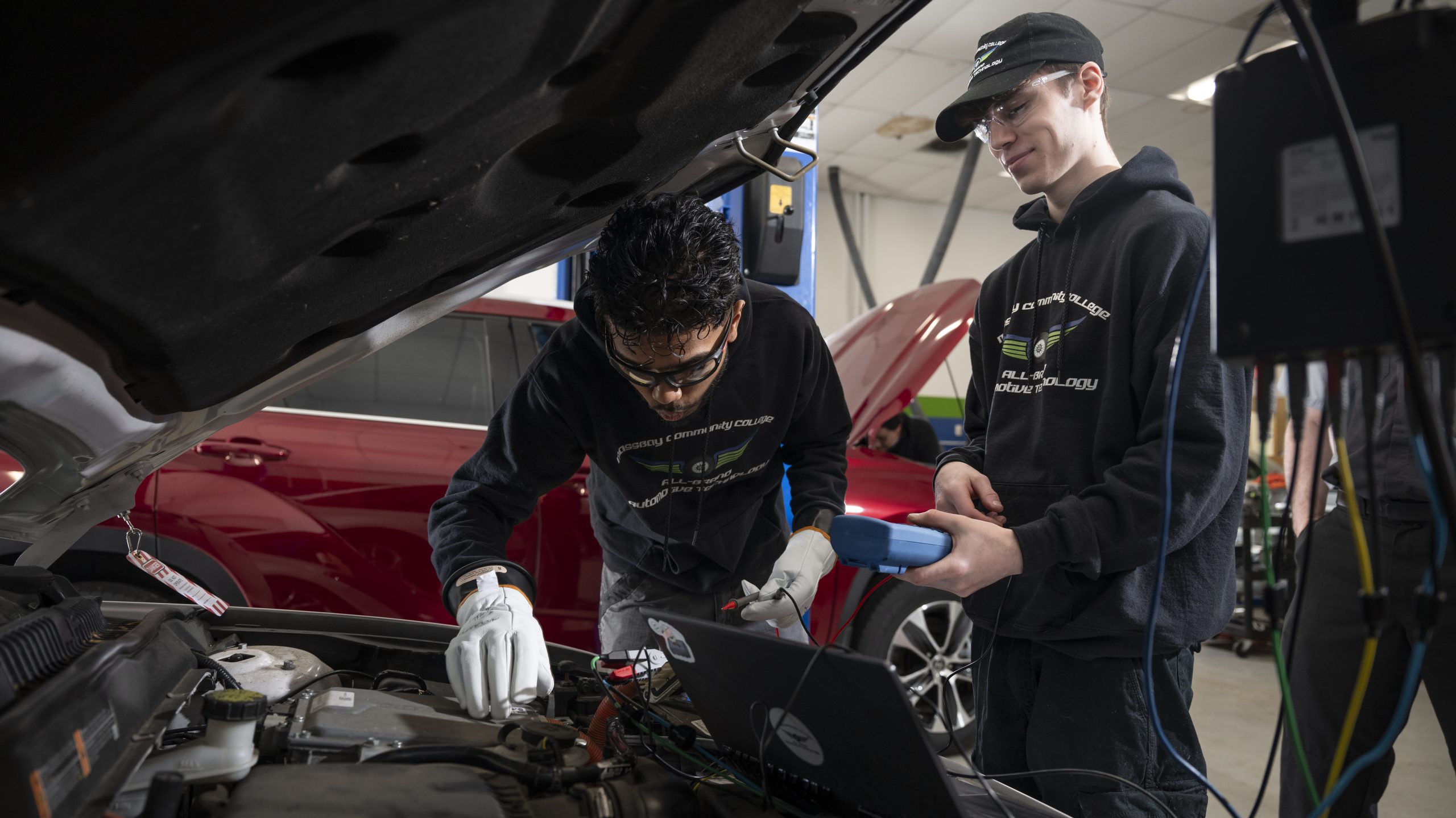 MassBay Community College Automotive Technology students train on a car at the MassBay Ashland campus, Ashland, MA, April 2024 (Photo/ MassBay Community College).