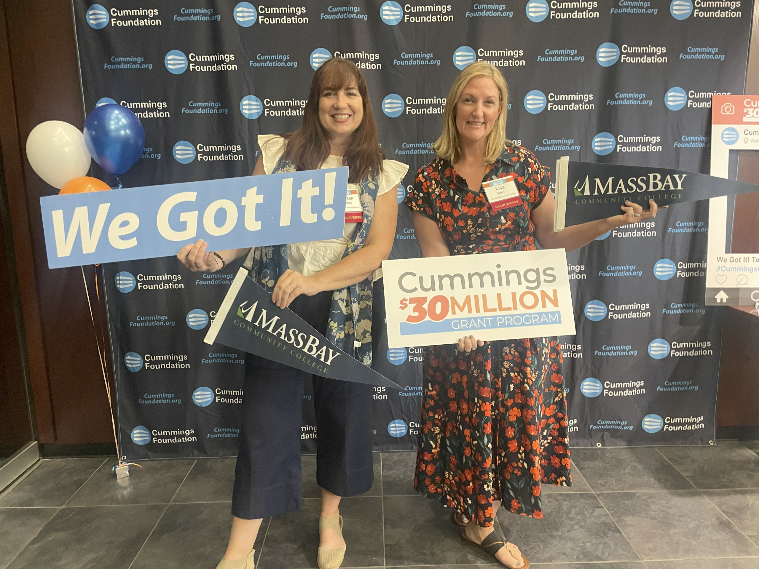 MassBay Community College (left to right) Executive Director of Corporate Partnerships, Workforce Development and Community Education Colleen Coffey and Vice President for Enrollment Management Lisa Slavin pose at the Cummings Foundation $30 Million Grant Program announcement, Burlington, MA, June 2025 (Photo/ MassBay Community College).